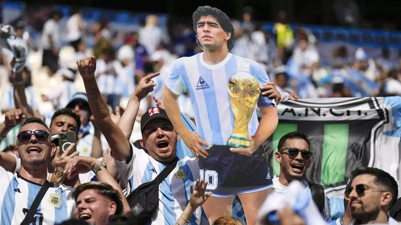 Fans at World Cup pay homage to Maradona with shirts and chants