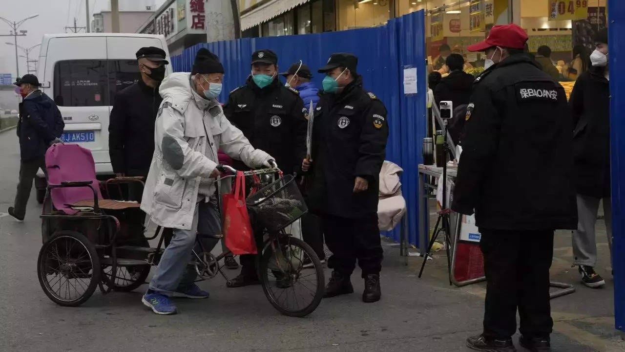 China expands lockdowns as Covid-19 cases hit daily record. (AP)