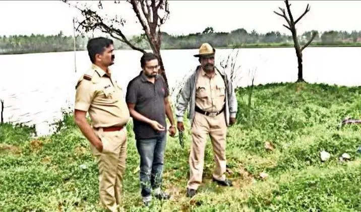 CRIME SCENE: Rahul, held on charges of killing his daughter and dumping her body in a lake, was on Friday taken for spot mahazar