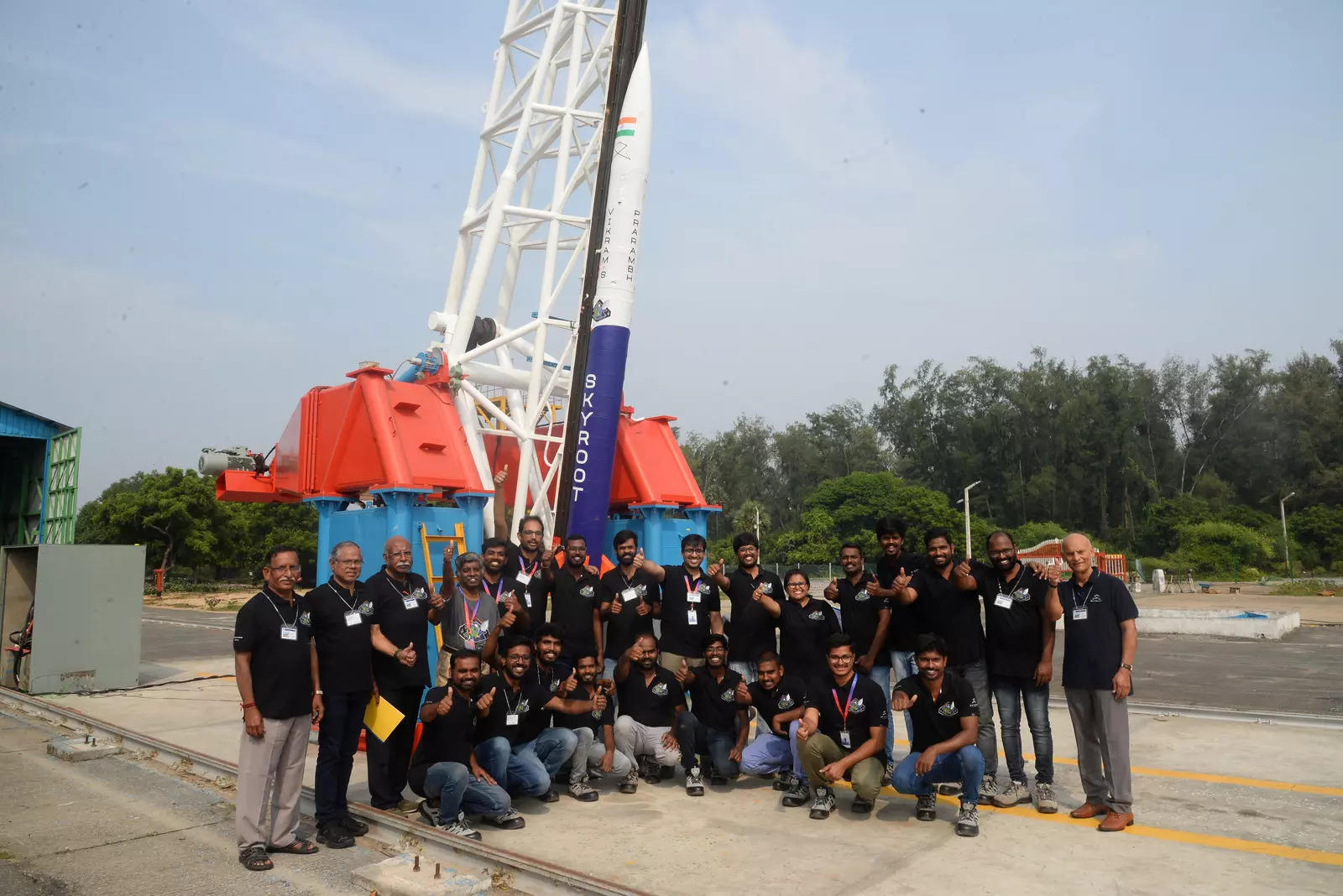 Employees pose in front of Vikram-S rocket, India's first private rocket developed by Skyroot, an Indian Space-Tech startup at a spaceport in Sriharikota 