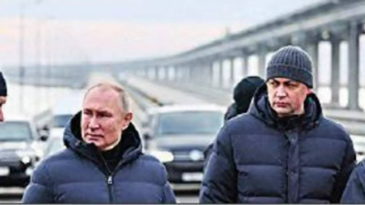 President Putin on Monday drove across the Crimean Bridge linking southern Russia to the annexed Crimean peninsula (Reuters)