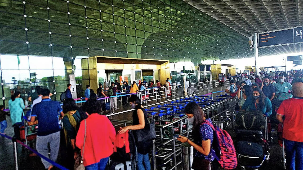 Man tries to enter Mumbai airport with fake ID to see off son | Mumbai News - Times of India