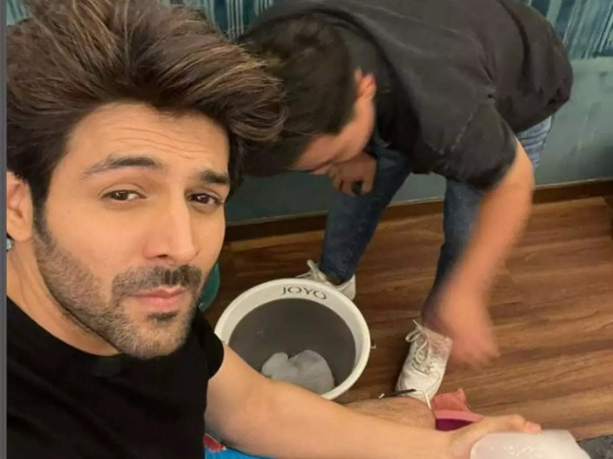 Kartik Aaryan suffers leg ache after song shoot of ‘Shehzada’; dips his feet in ice – Pic inside | Hindi Movie News