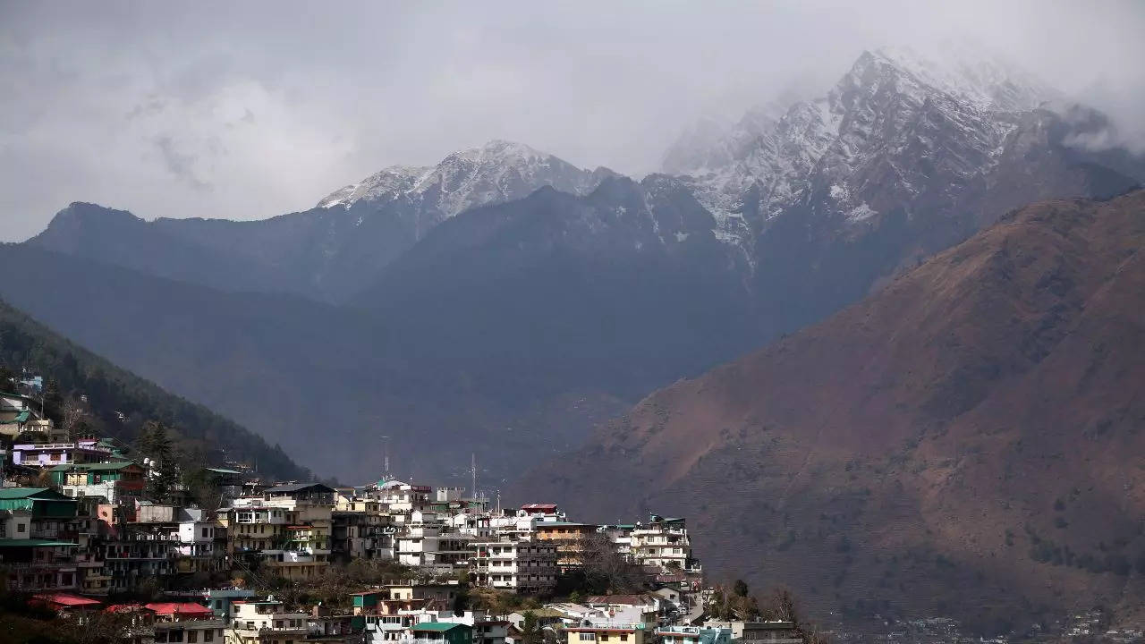 A view of the snow-capped mountains from Joshimath city. (ANI)