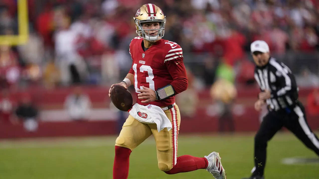 Brock Purdy: San Francisco 49ers clinch NFC West with win over Seattle  Seahawks as rookie quarterback impresses again