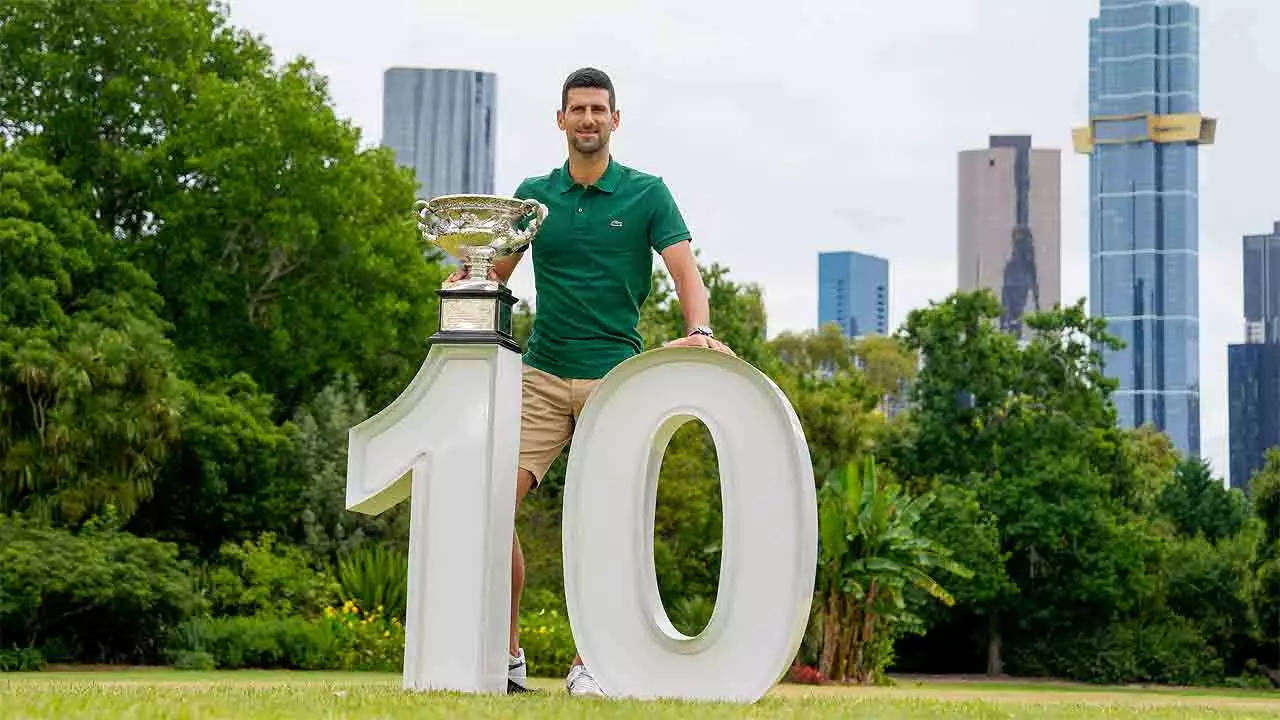 Novak Djokovic with the Norman Brookes Challenge Cup in Melbourne. (AP Photo)