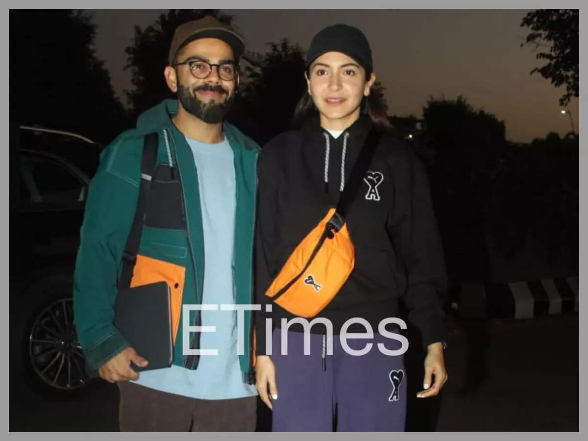 Anushka Sharma- Virat Kohli Glow as They Walk Hand-in-Hand at Mumbai  Airport- PICS