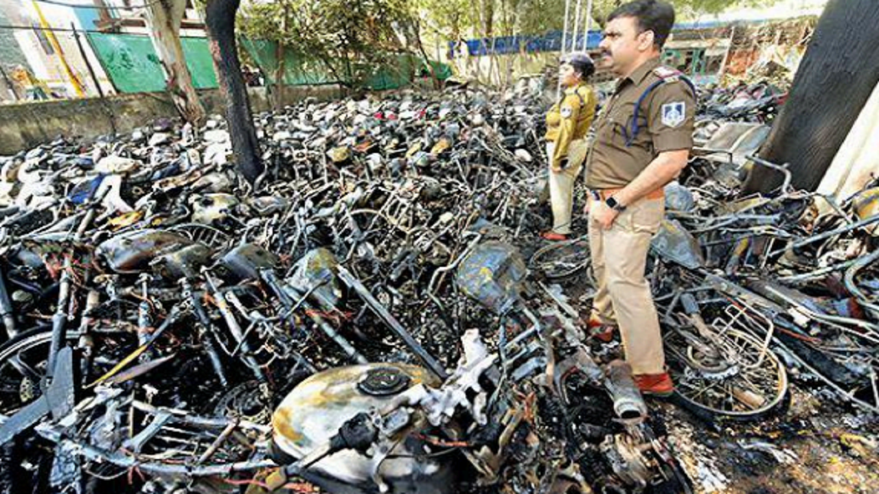 The vehicles after the fire on Vijay Nagar police station premises