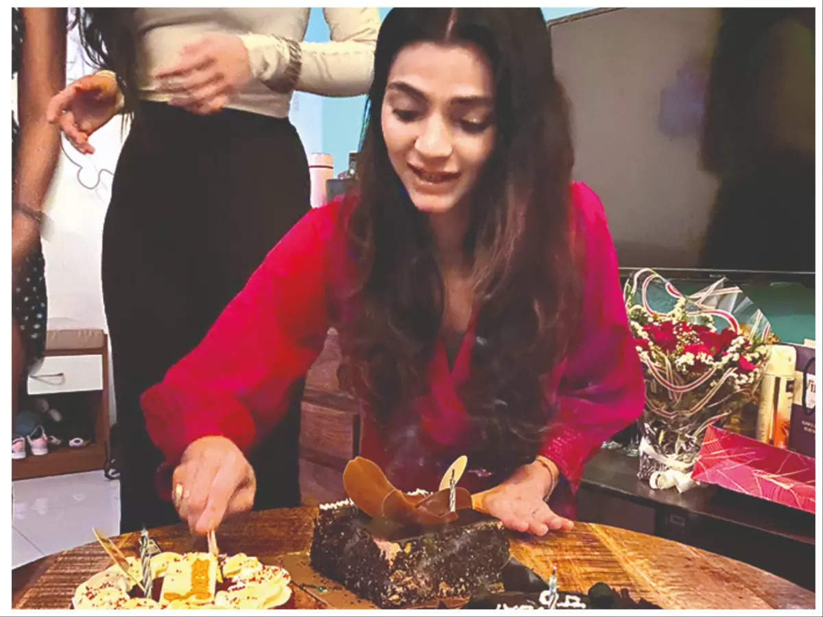 Jyothsna Channdola cutting cakes on her birthday