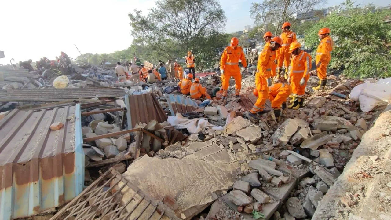 Two persons died and nine twelve were rescued after a building collapsed in Bhiwandi in Maharashtra on Saturday.  (TOI photo by Anil Shinde)