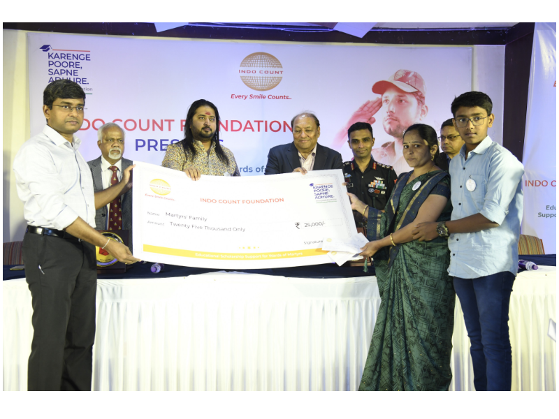 collector-giving-cheque-3