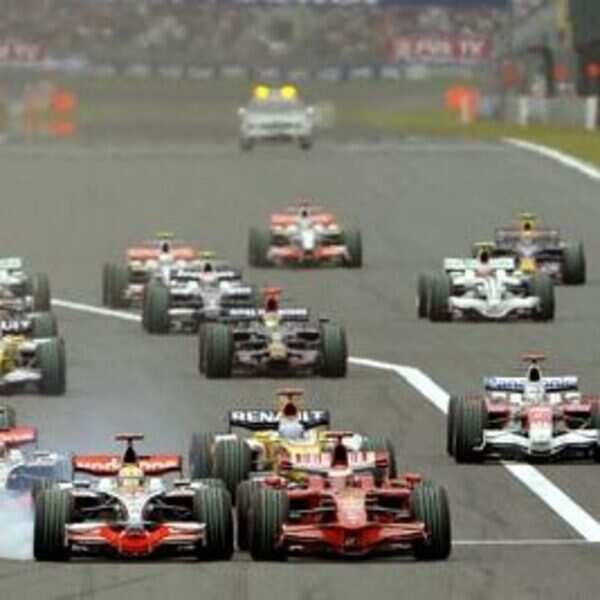 Renault Formula One driver Fernando Alonso celebrates after