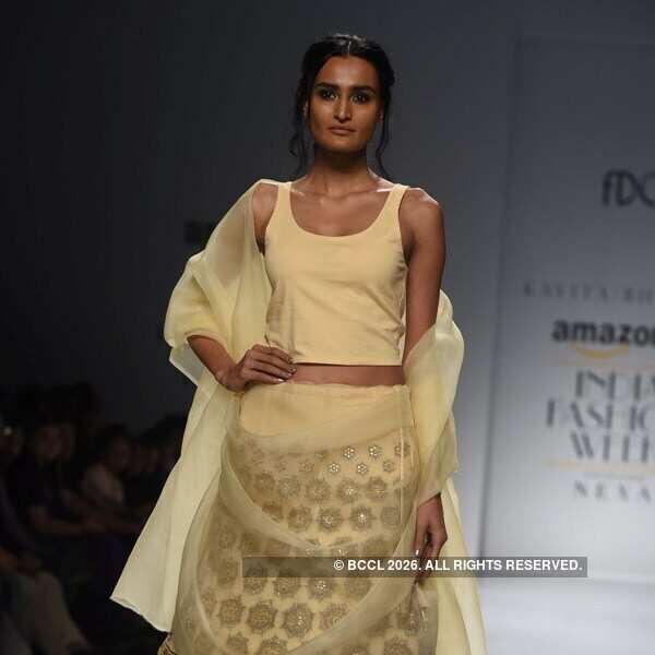 Designer Kavita Bhartia s collection is showcased by a model as she walks the ramp on Day 4 of the Amazon India Fashion Week AIFW Spring Summer 2018, held at NSIC Grounds in