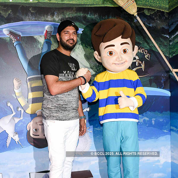 Yuvraj Singh with Rudra during the launch of Nickelodeon TV channel's new  cartoon show 'Rudra - Boom Chick Chick Boom' in Mumbai - Photogallery