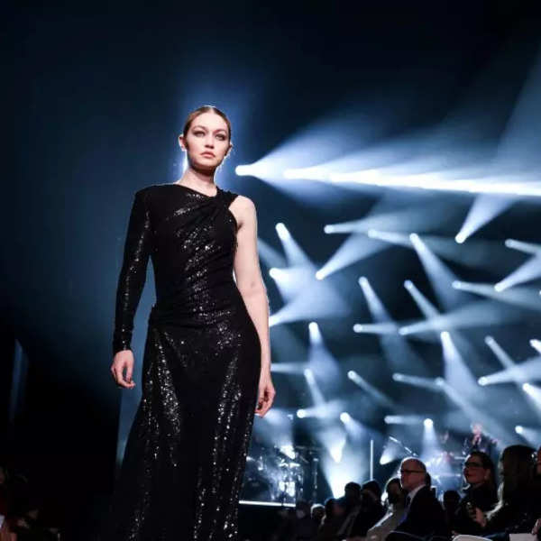 May 2, 2022 - Bella Hadid Arrives For The Met Gala Wearing Raf Simons Dress  - HADIDSCLOSET