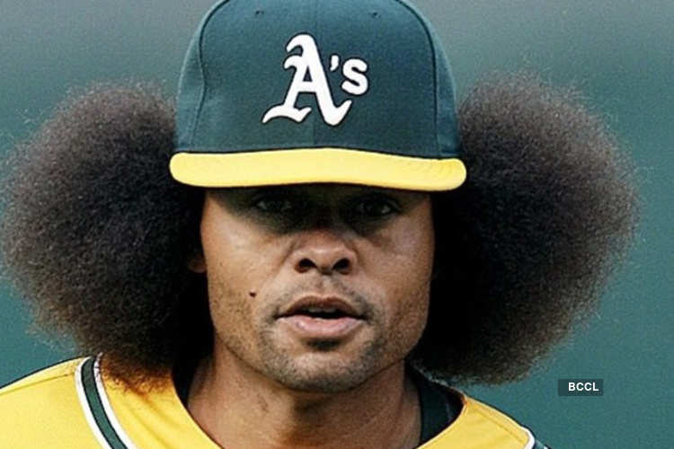 An American baseball center fielder, Coco Crisp has attained immense  popularity due to his peculiar hair style.