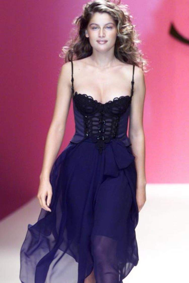French top model Laeticia Casta presents this laced bustier worn 