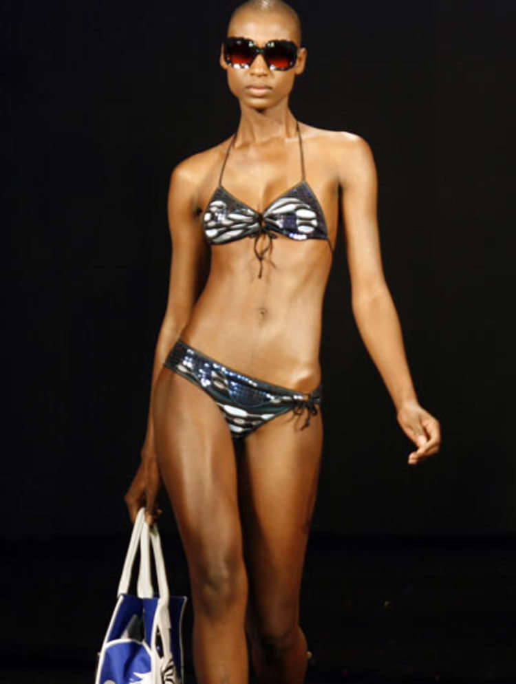 A model walks the runway wearing Custo Barcelona creation by