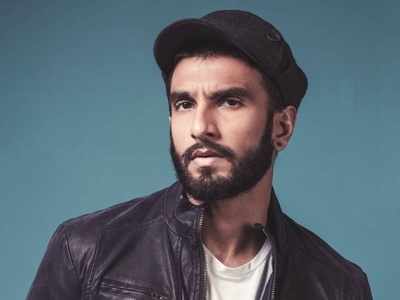Ranveer Singh Looks Dapper In Black T-shirt With Green Leather