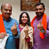 Haveri: CM Basavaraj Bommai, his daughter Aditi and son Bharat Bommai cast their vote at Government Higher Primary School in Shiggaon, Haveri district.