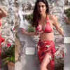 Article image for: Mouni Roy beats summer heat in a printed red bikini, flaunts her curves on camera