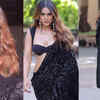 Article image for: <i class="tbold">nia sharma</i> gets all glammed up in a black saree and plunging neckline blouse; take a look!
