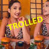 Article image for: TROLLED! <i class="tbold">nora</i> Fatehi enjoys lip-smacking food wearing a polka-dotted dress with deep neckline; netizens point out 'Foundation doesn't match the body'
