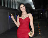 Sunny Leone makes heads turn in a red dress, celebrates birthday with the paps