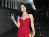 Sunny Leone makes heads turn in a red dress, celebrates birthday with the paps