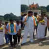 Article image for: Congress workers perform <i class="tbold">purification</i> rituals at Vidhan Soudha in Bengaluru