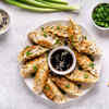 What is the difference between Momos and Dumplings