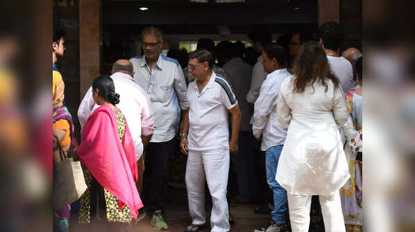 Family members gather to bid farewell