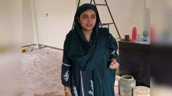 Showing their house which is under construction
