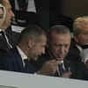 Turkish President Recep Tayyip Erdogan, center, listens to UEFA president Aleksander Ceferin, while attending the Champions League final between Manchester City and Inter Milan at the Ataturk Olympic Stadium in Istanbul.