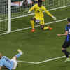 Manchester City's Erling Haaland fires a shot as Inter Milan's goalkeeper Andre Onana saves during the Champions League final.