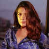<i class="tbold">pooja gor</i>