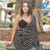Article image for: Monalisa grabs attention as she poses in a <i class="tbold">black saree</i>