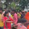 Civil defence volunteers provide food to evacuated people at Delhi's Yamuna Bank as low-lying areas get inundated owing to the swelling Yamuna river.