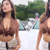 Article image for: <i class="tbold">kate sharma</i> slays in a brown-coloured tie-up crop top with a plunging neckline
