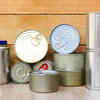 Use cans as spoon holders