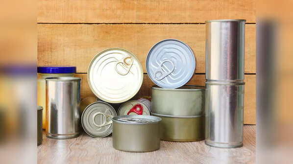 Use cans as spoon holders