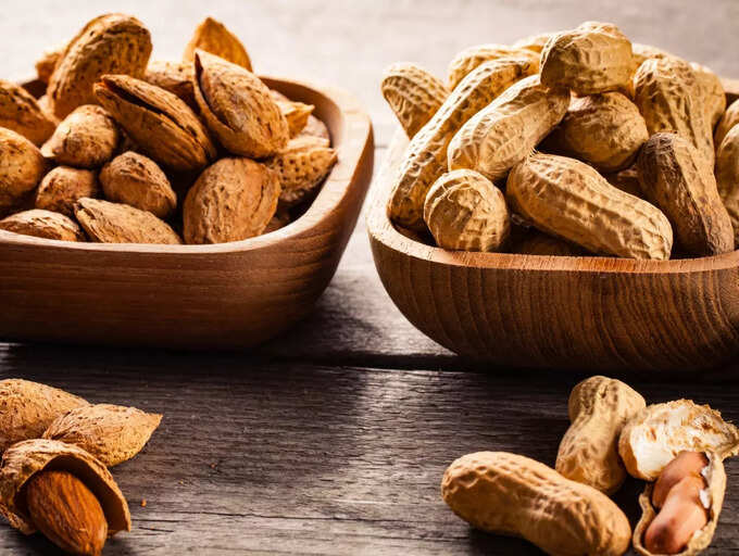 Peanut vs Almonds Which nut has more nutrients The Times of India