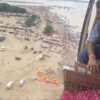 Article image for: UP: Prayagraj District Administration showers flower petals on devotees by helicopter on fourth Monday of ‘Sawan’
