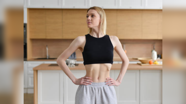 We all suck in our stomachs to look good in photographs