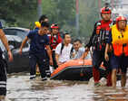 Typhoon Doksuri caused rivers in China to overflow, leaving residents stranded