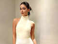 Ananya Panday looks classy in white bodycon dress and emerald jewels