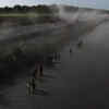 Article image for: Asylum-seekers traverse Rio Grande into the US