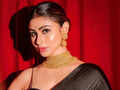 Mouni Roy stays true to her signature style in black saree