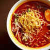 Consuming spicy or acidic foods