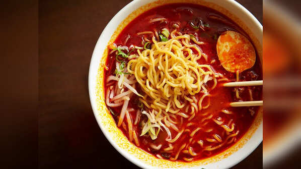 Consuming spicy or acidic foods
